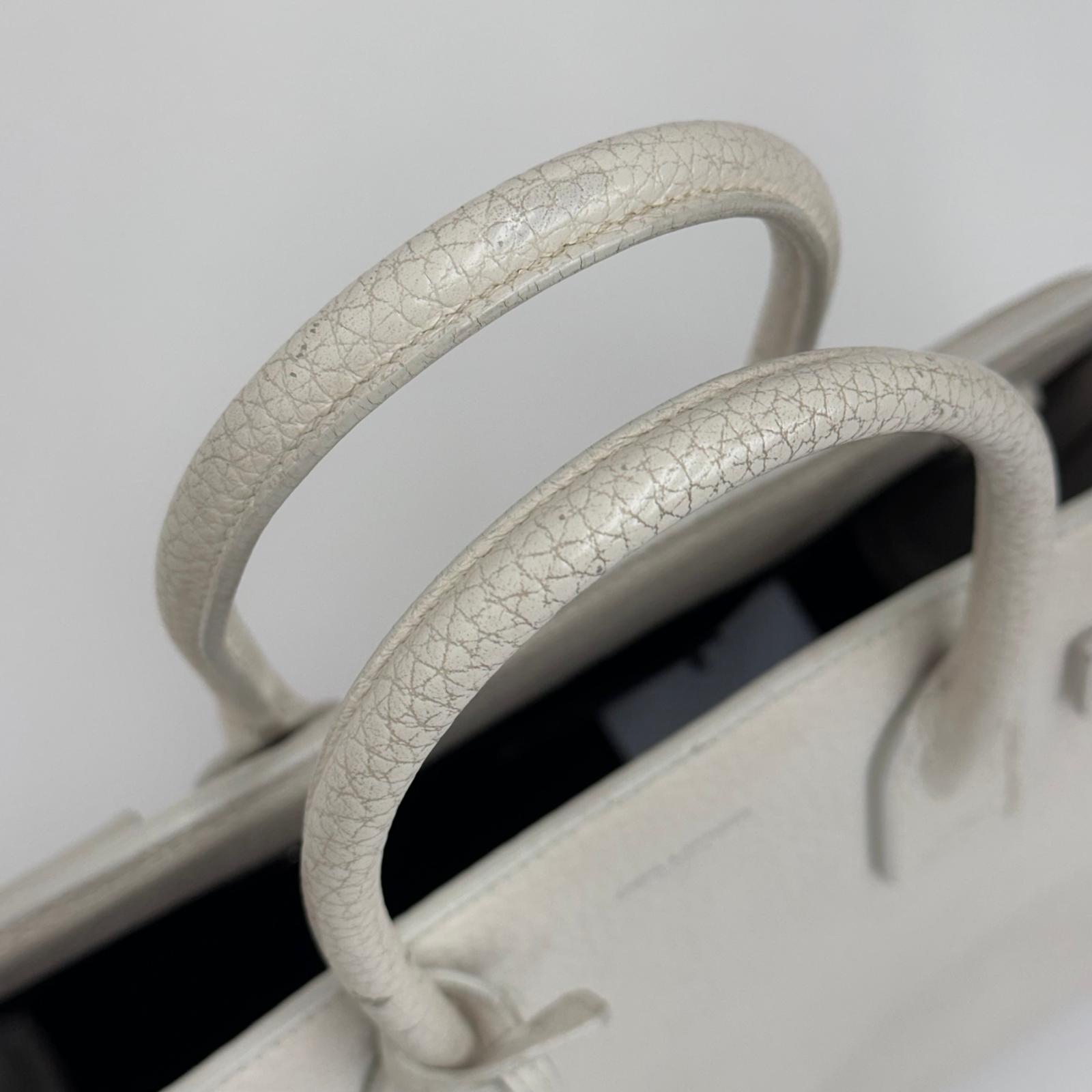 Saint Laurent Borsa Sac de Jour Baby in pelle martellata bianca