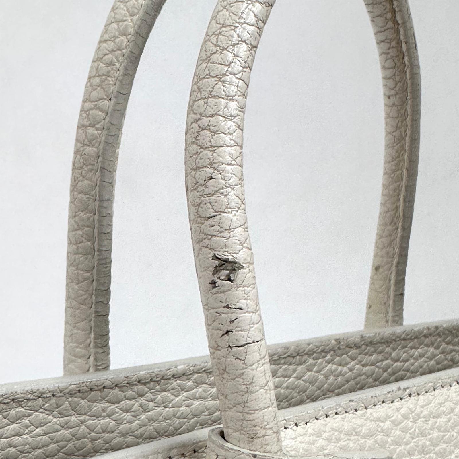 Saint Laurent Borsa Sac de Jour Baby in pelle martellata bianca