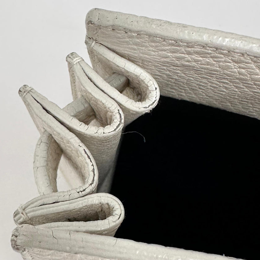 Saint Laurent Borsa Sac de Jour Baby in pelle martellata bianca