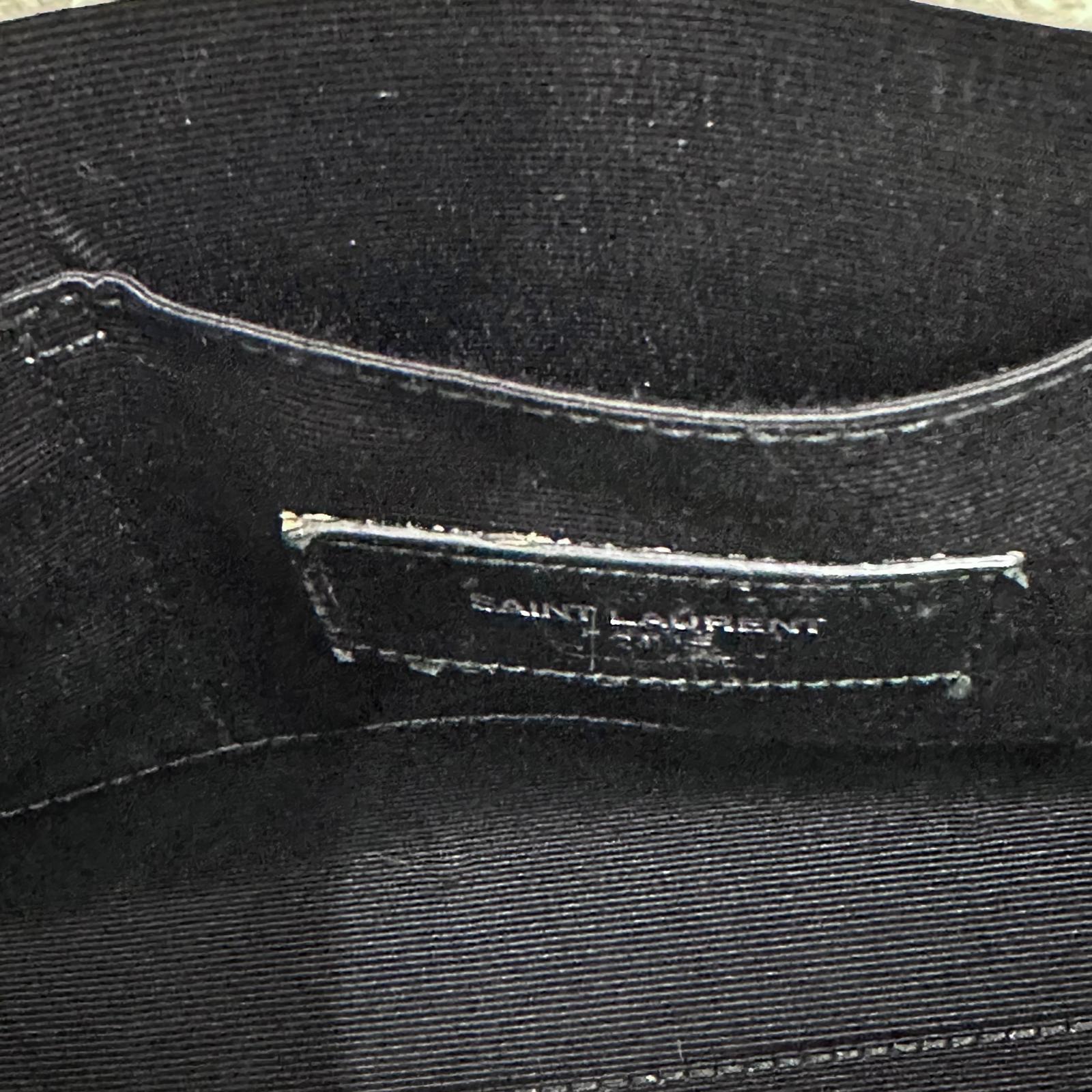 Saint Laurent Borsa Sac de Jour Baby in pelle martellata bianca