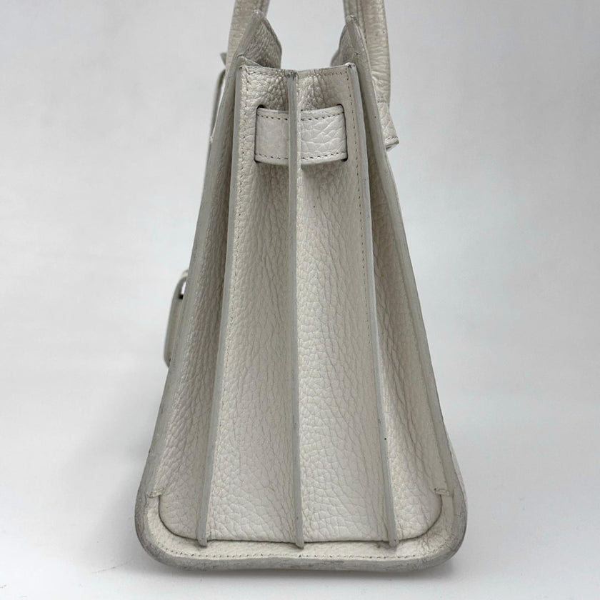 Saint Laurent Borsa Sac de Jour Baby in pelle martellata bianca