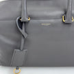 Saint Laurent Borsa modello Duffle in pelle grigia a due vie
