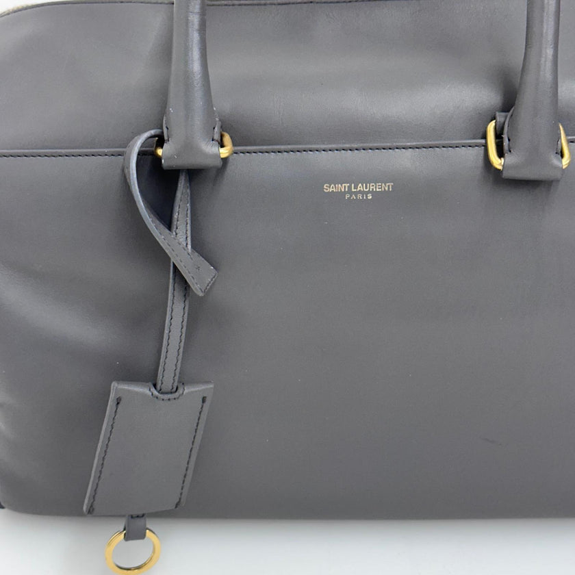 Saint Laurent Borsa modello Duffle in pelle grigia a due vie