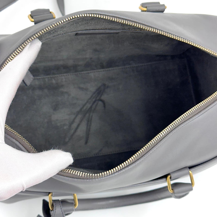 Saint Laurent Borsa modello Duffle in pelle grigia a due vie
