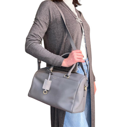 Saint Laurent Borsa modello Duffle in pelle grigia a due vie