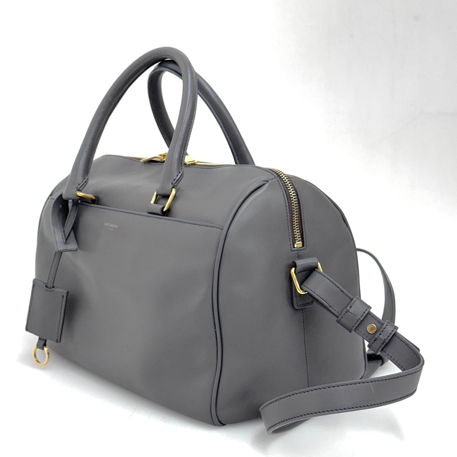 Saint Laurent Borsa modello Duffle in pelle grigia a due vie