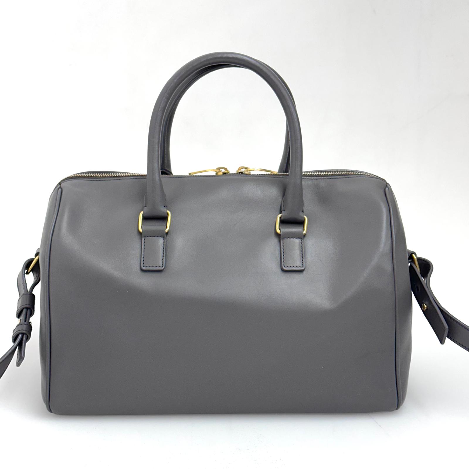 Saint Laurent Borsa modello Duffle in pelle grigia a due vie