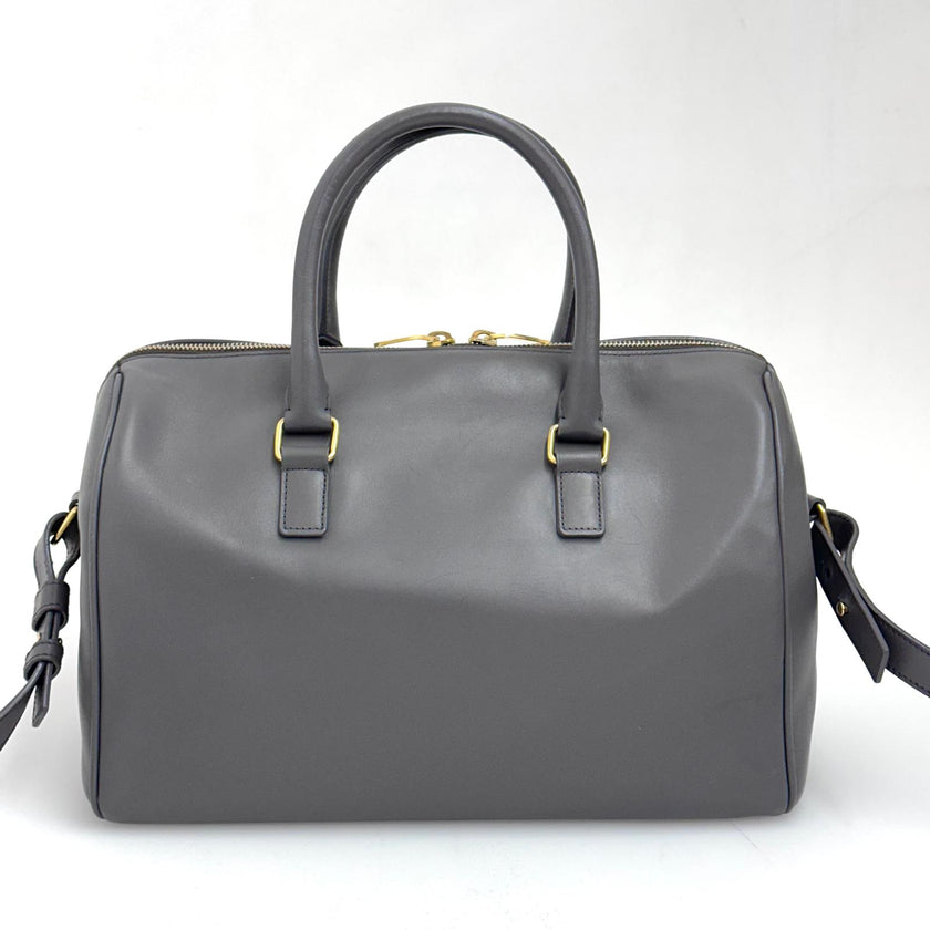 Saint Laurent Borsa modello Duffle in pelle grigia a due vie