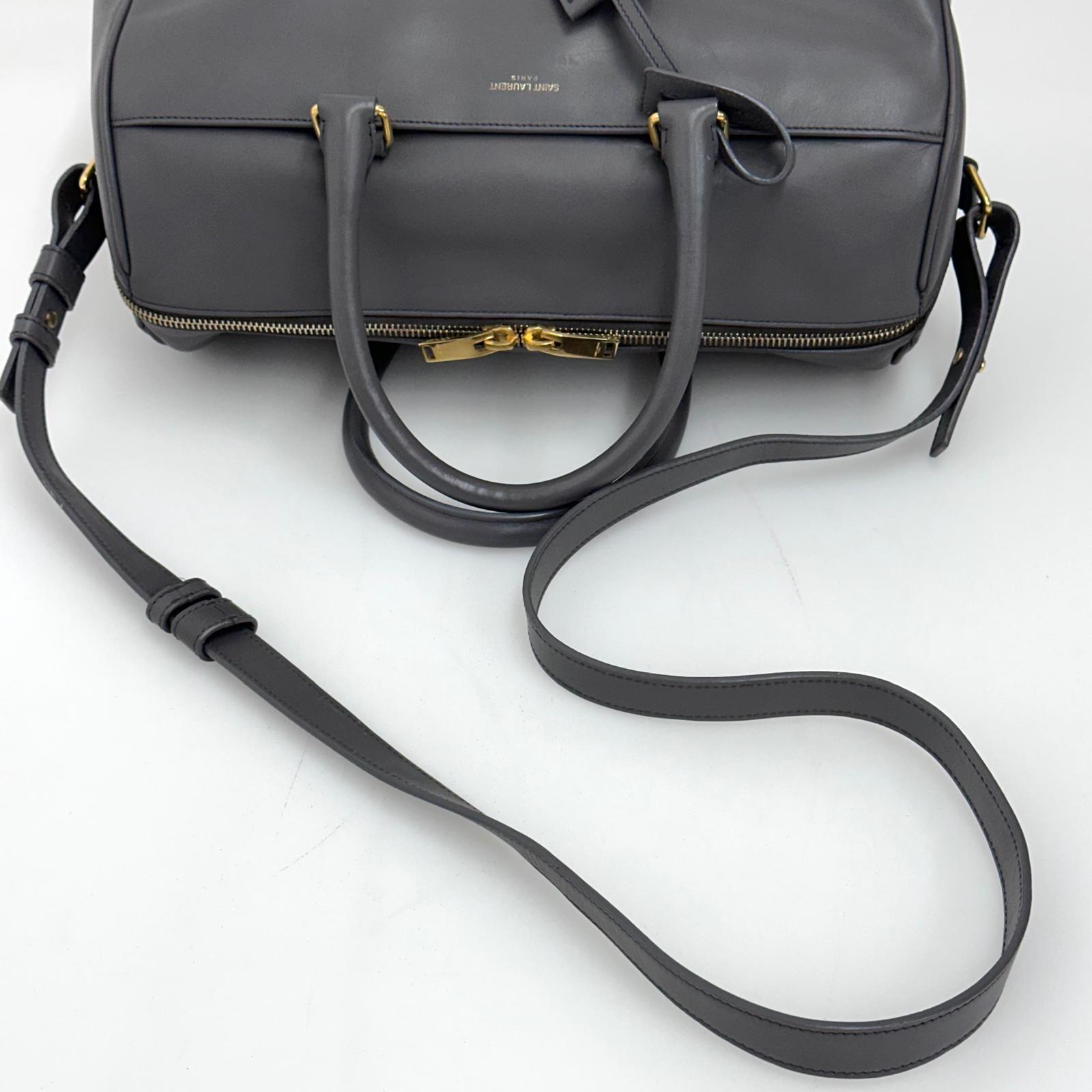 Saint Laurent Borsa modello Duffle in pelle grigia a due vie
