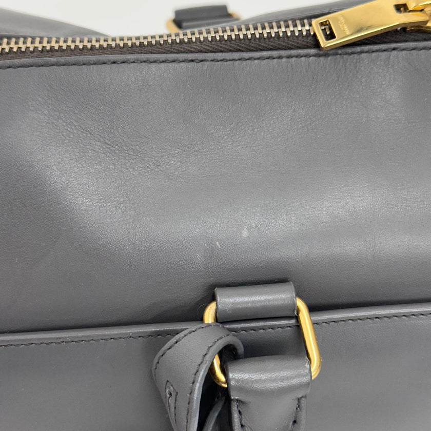Saint Laurent Borsa modello Duffle in pelle grigia a due vie