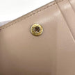 Saint Laurent Portafoglio compatto in pelle beige