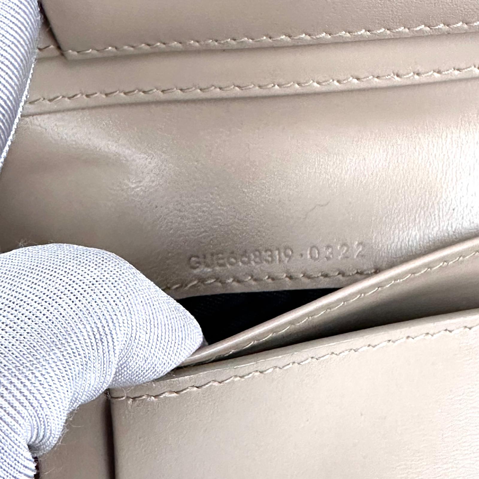 Saint Laurent Portafoglio compatto in pelle beige