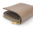 Saint Laurent Portafoglio compatto in pelle beige