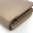 Saint Laurent Portafoglio compatto in pelle beige