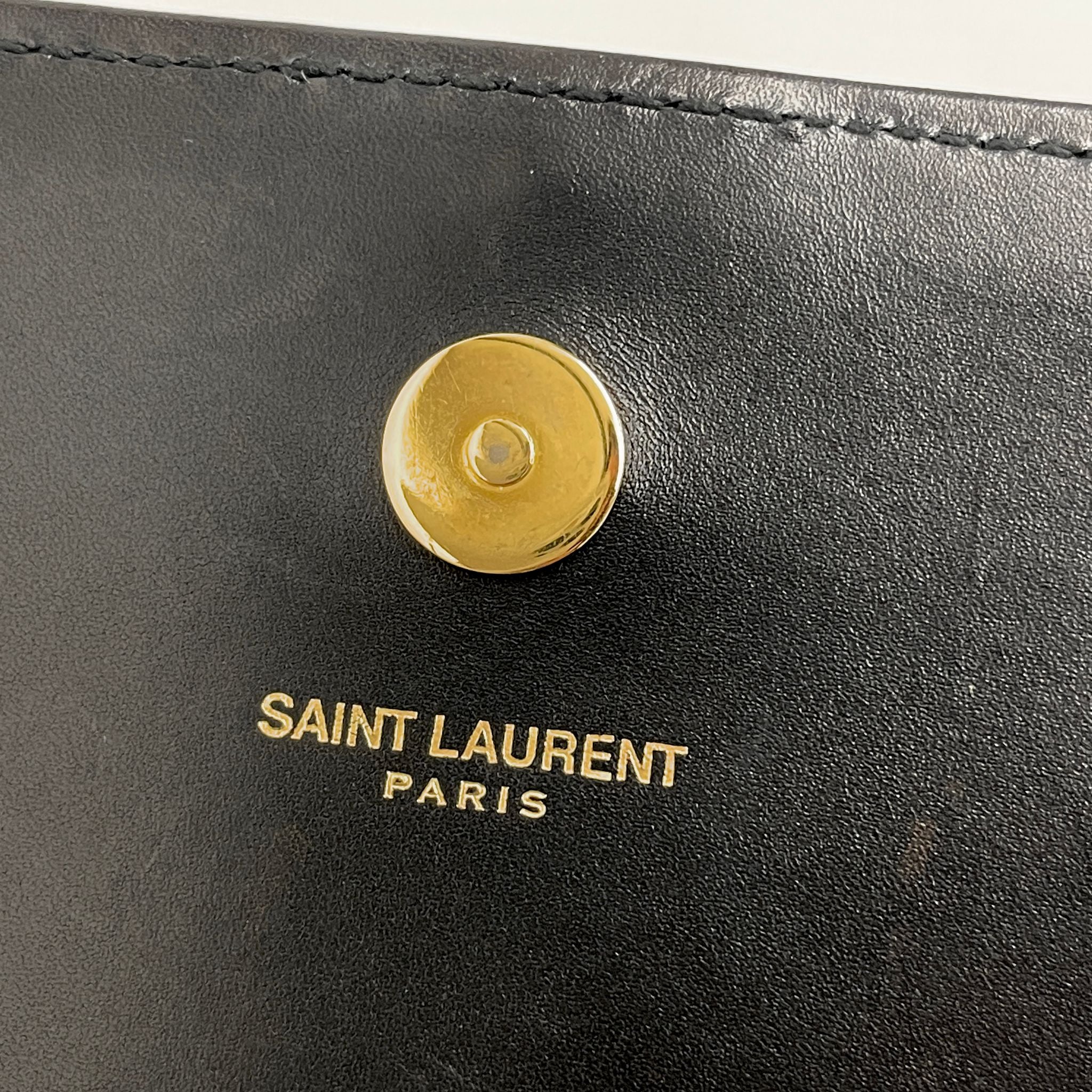 Saint Laurent borsa Pochette Kate Monogram in pelle nera con frangia