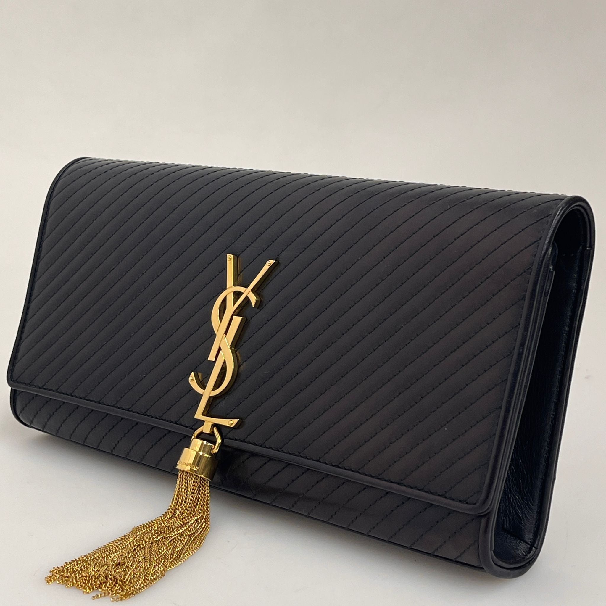 Saint Laurent borsa Pochette Kate Monogram in pelle nera con frangia