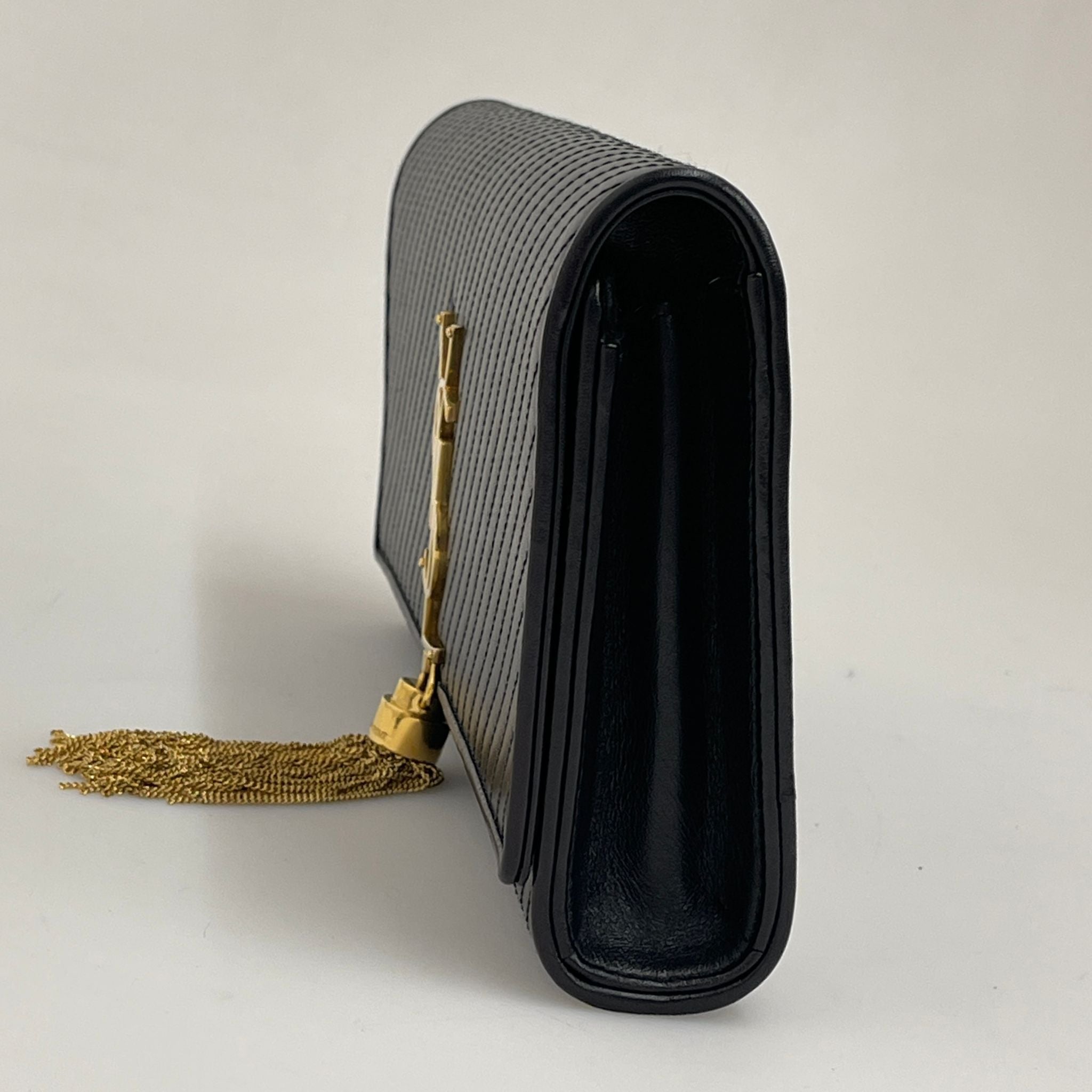 Saint Laurent borsa Pochette Kate Monogram in pelle nera con frangia