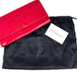 Saint Laurent pochette a mano Belle de Jour in vernice rossa