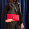 Saint Laurent pochette a mano Belle de Jour in vernice rossa