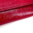 Saint Laurent pochette a mano Belle de Jour in vernice rossa