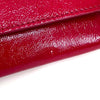 Saint Laurent pochette a mano Belle de Jour in vernice rossa