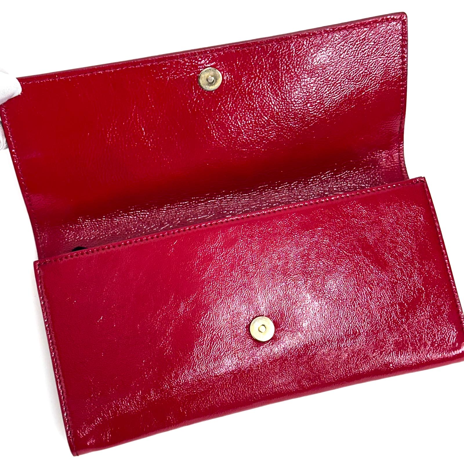 Saint Laurent pochette a mano Belle de Jour in vernice rossa